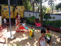 children playing in pre school care